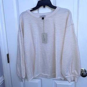 Medium off white/cream colored long sleeve tee
